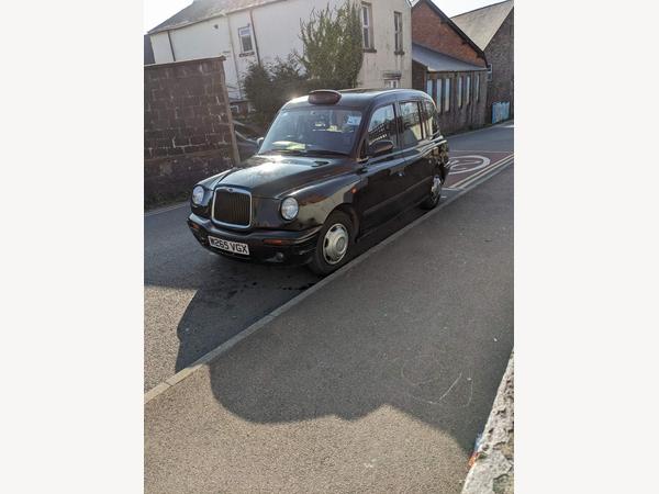 London Taxis International TXI Silver